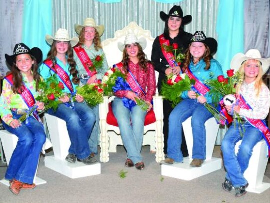 Mayah Morrison, crowned 2022-23 Kendall County Fair Association queen on Thursday night, sits on her throne surrounded by members of the fair queen court. Pictured are, from left, Junior Miss Lillie Vogt, Princess Marilyn Curd, Big Heart Award winner Jordan Hoever, first runner up Brittany...