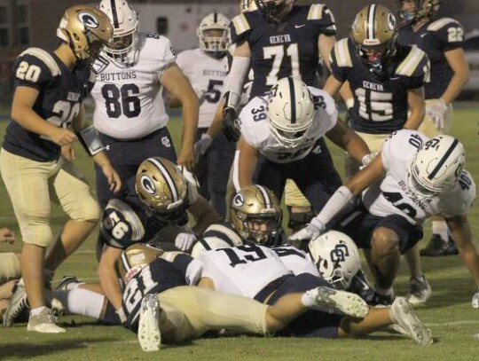 There’s a mad scramble for the ball after Geneva attempted an onside kick against the Buttons. The Eagles attempted two onside kicks but Central Catholic recovered both.