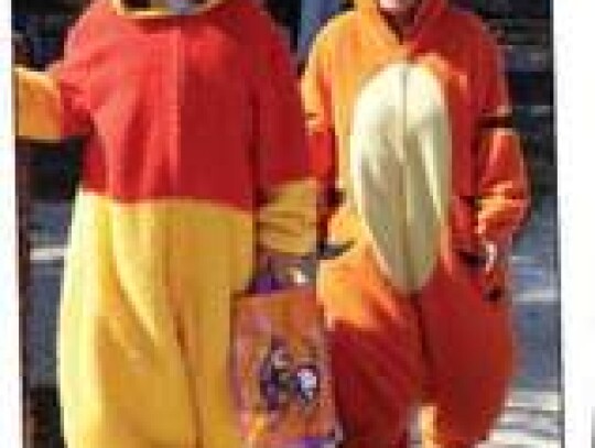 Godi and Christian took advantage of the cooler fall weather in their coordinating Winnie the Pooh and Tigger costumes.