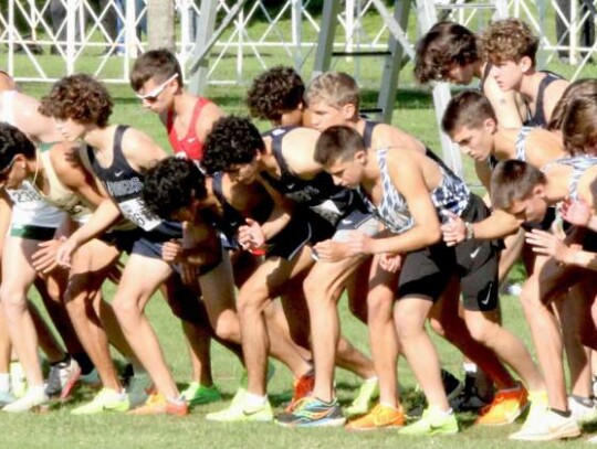 The Champion boys leave the starting line at last Saturday’s 5A state race where they finished seventh.