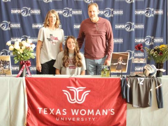 Champion’s Kelsey Rogers signed a national letter of intent to play volleyball at Texas Women’s University. Champion’s Kelsey Rogers signed a national letter of intent to play volleyball at Texas Women’s University.