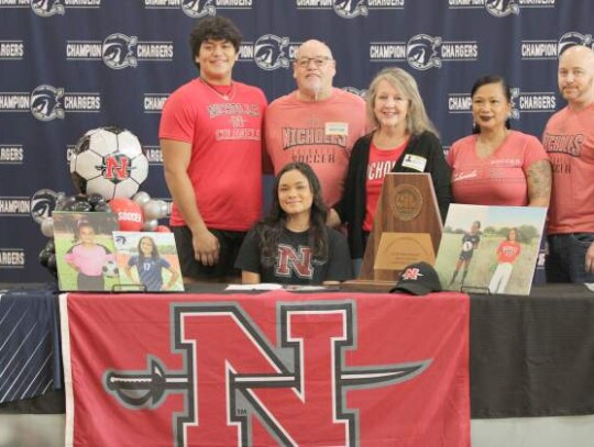 Champion’s Nevaeh Garris signed a national letter of intent to play soccer at Nicholls State University. Champion’s Nevaeh Garris signed a national letter of intent to play soccer at Nicholls State University.