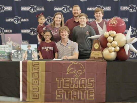 Champion’s Connor Warzecha signed a national letter of intent to compete in track and field at Texas State University. Champion’s Connor Warzecha signed a national letter of intent to compete in track and field at Texas State University.