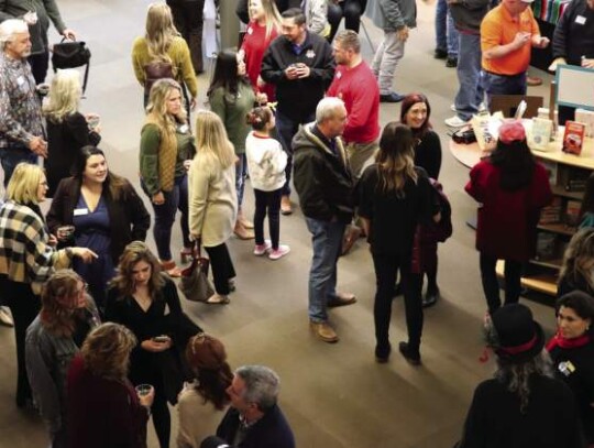 The Boerne library was abuzz Thursday afternoon after both library staff and Boerne Radio runners celebrated their continued work. Photos by Zachary-Taylor Wright