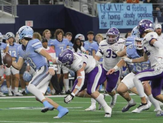 Boerne’s Braden Bays chases China Spring QB Cash McCollum during Friday’s 4A DI state title game in Arlington. </br> Star photo by Russell Hawkins