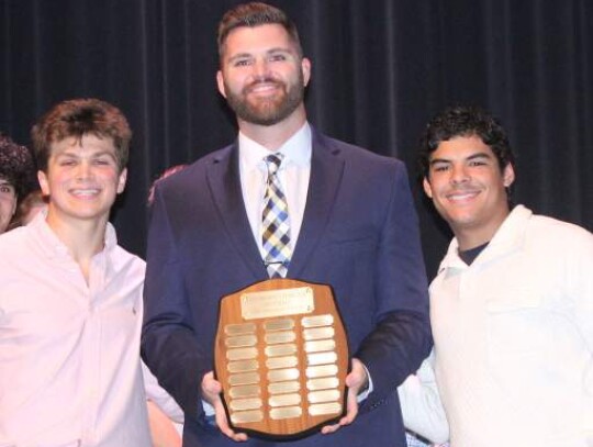 Coach Travis Chrisman handed out the Champion Offensive Club Award to Kannon Brooks and Jordan Ballin after Brooks caught more than 1,000 yards in passes and Ballin threw for more than 1,000 yards this year.