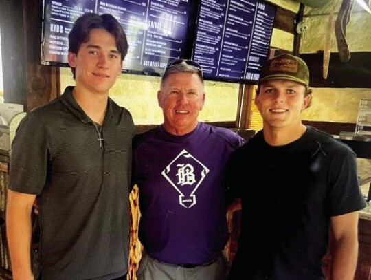 BHS had two graduates selected in this year’s MLB draft, Cole Phillips and Douglas Hodo. Phillips and Hodo pose for a photo with Greyhounds coach Bill Merrell who recorded his 650th win last spring and is scheduled to retire at the end of the school yea