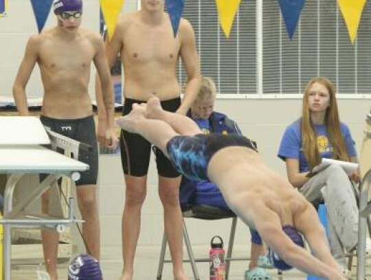 Boerne’s Cooper Wagner touches the wall as Carter Schuessler leaves the starting block, while Jack Parsons and Henry Johnson wait their turn during the 400-freestyle relay. </br> Star photos by Kerry Barboza