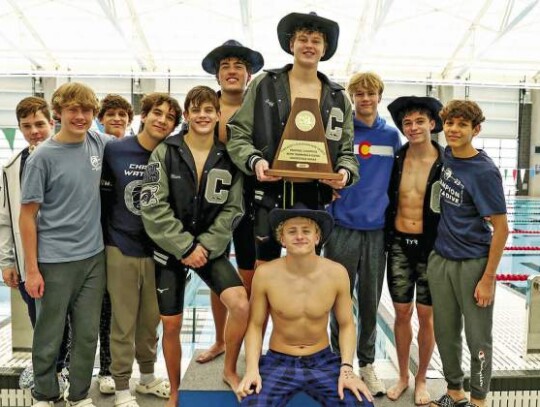 The Champion swim/dive teams celebrate winning the Region VII-5A boys and girls titles recently. Several qualified for this weekend’s state meet. </br> Star photos by Adrian Guerra