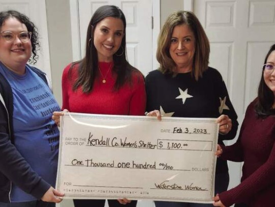 The Waterstone Women’s Bunco Group raised $1,100 for the Kendall County Women’s Shelter which was handed over to the nonprofit organization in town last week. Pictured: Sofia Holl; Director of Communication, Brooke House; Executive Director, Trish McL