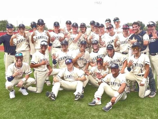 The Boerne Champion baseball team is holding up all five fingers to symbolize advancing to the fifth round of the 5A playoffs after they defeated Corpus Christi Ray last week. </br> Star photo by Kerry Barboza