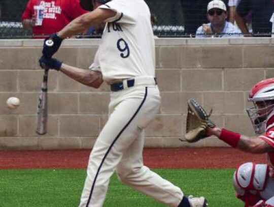 Evan Kuhl (9) rips the ball for the Chargers against Ray. Kuhl hit two triples in Champion’s close out game against the Texans. </br> Star photo by Chris Tilton