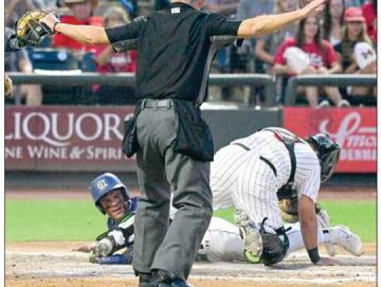 Charger Jordan Ballin slides home safely and scores the team’s first run of the game during Thursday’s 5A state semifinals game in Round Rock at Dell Diamond. </br> Star photo by Chris Tilton