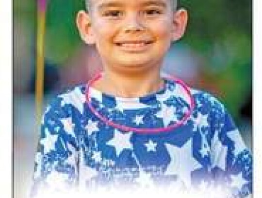 Antonio Gonzalez, 7, of Boerne, celebrates the July Fourth holiday with a sparkler at Sonora Bank.