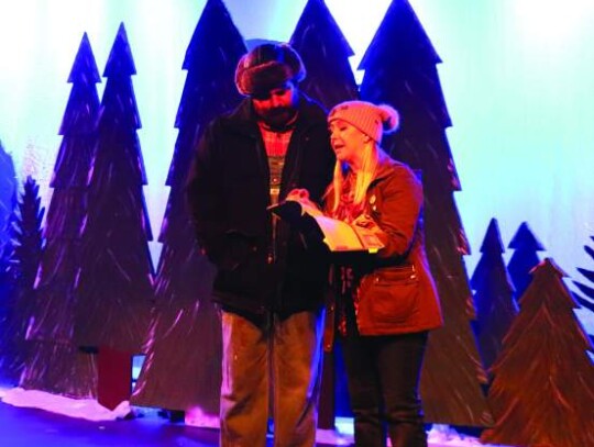 Glory (Emily Piperato) shares information with East (Devon Vanderveer) about the Northern Lights that she used to arrive on his property. The two share the stage in the second scene of Act One of “Almost, Maine,” now playing at the Boerne Community Th