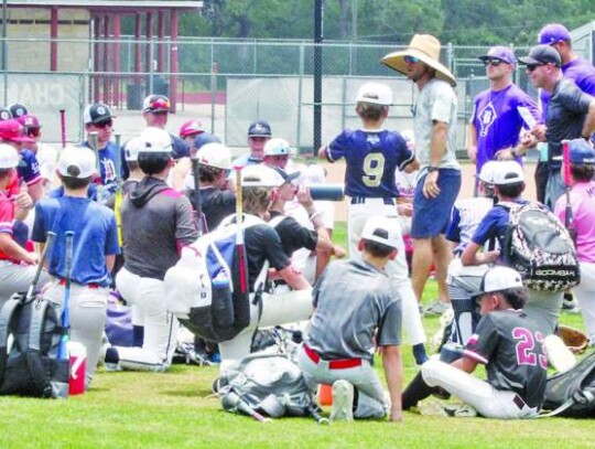 The BISD baseball coaches talk with the campers at the end of one of the sessions. </br> Star photo by Kerry Barboza