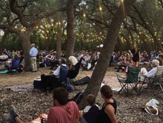 Attendees to Moondance relax in the shade of The Cibolo Center for Preservation. Moondance returns tonight, with attractions for the entire family. Courtesy photo